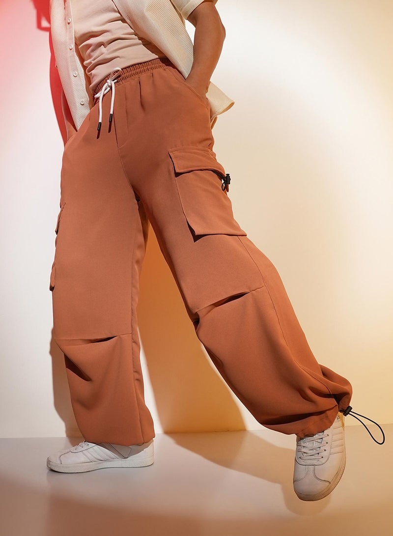 Campus Sutra Men's Sienna Brown Solid Cargo Parachute Trousers  - Image 1