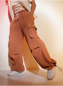 Campus Sutra Men's Sienna Brown Solid Cargo Parachute Trousers  - Image 1