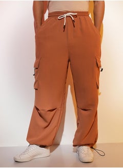 Campus Sutra Men's Sienna Brown Solid Cargo Parachute Trousers  - Image 2