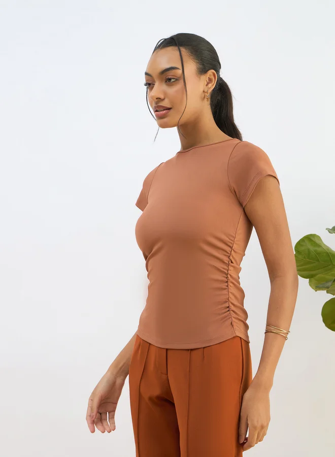 SASSAFRAS Sassafras Orange Knitted Short Sleeve Ruched Crop Top