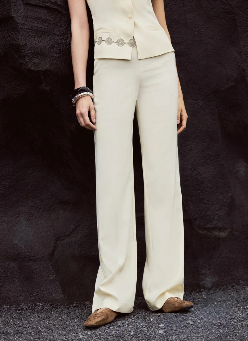 Flared trousers in suiting fabric with lace decor