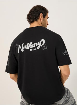 Slogan Print Textured Oversized T-Shirt - pzsku/Z33FA35C8AD1EEB5DC6CAZ/45/1741119859/244992bc-7699-4ef8-a629-021886f46d6f