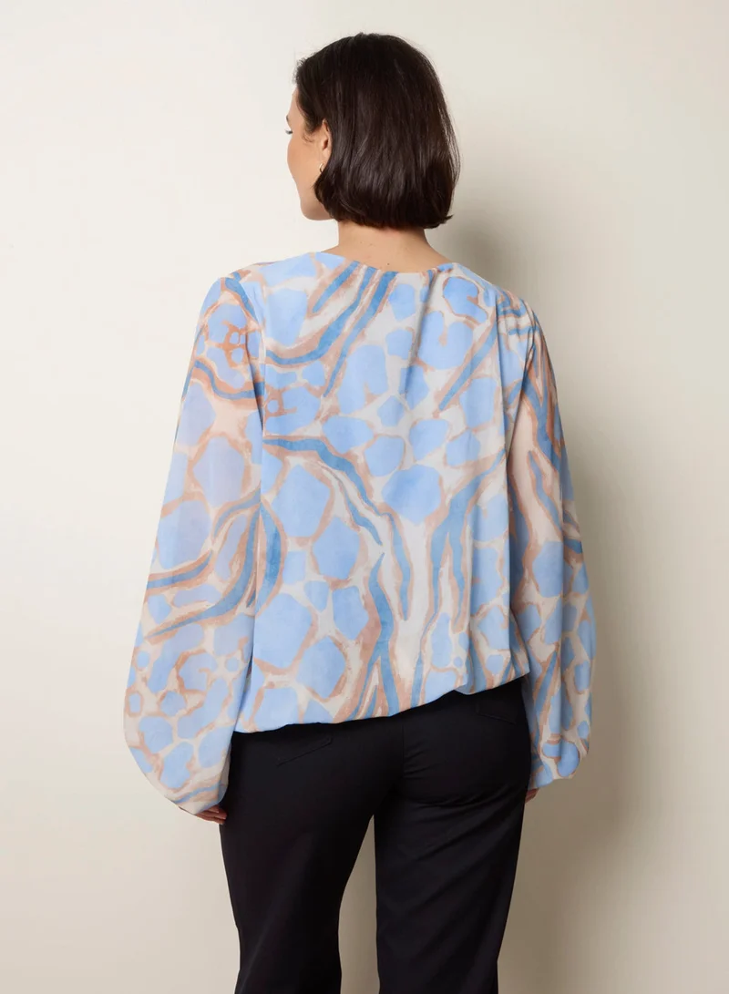 بلو فانيلا Abstract Print V Neck Puffball Top