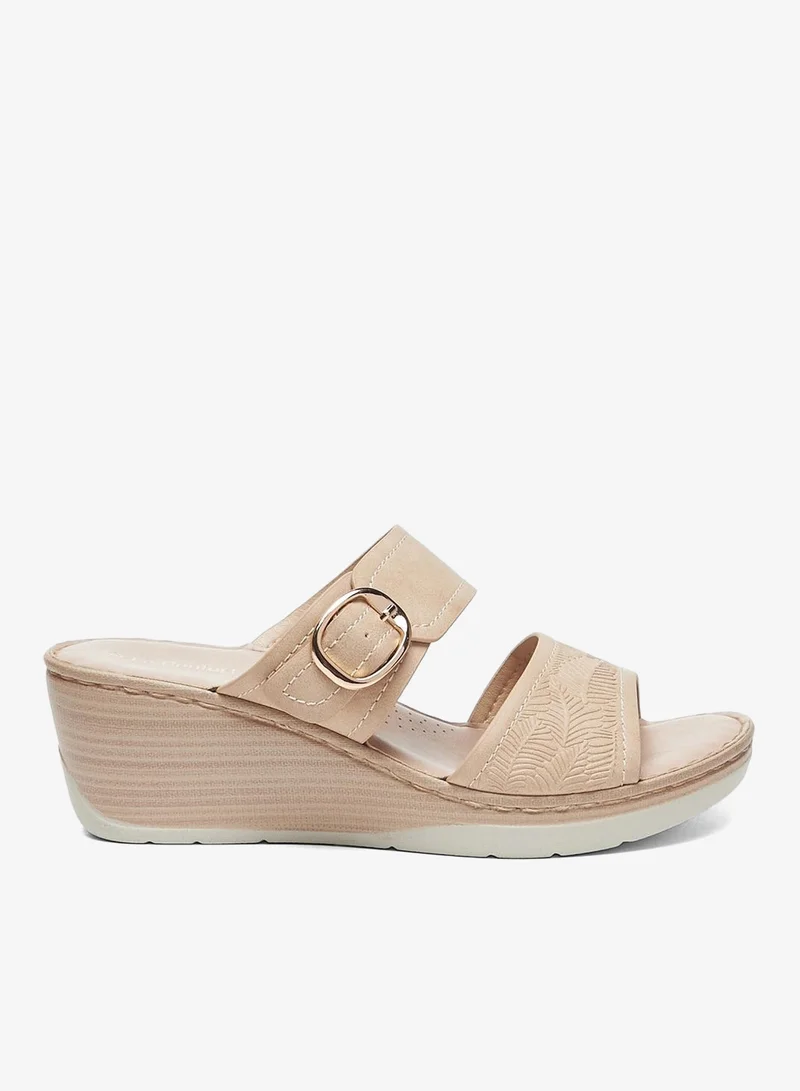 لو كونفورت صنادل بكعب إسفيني بحزامين