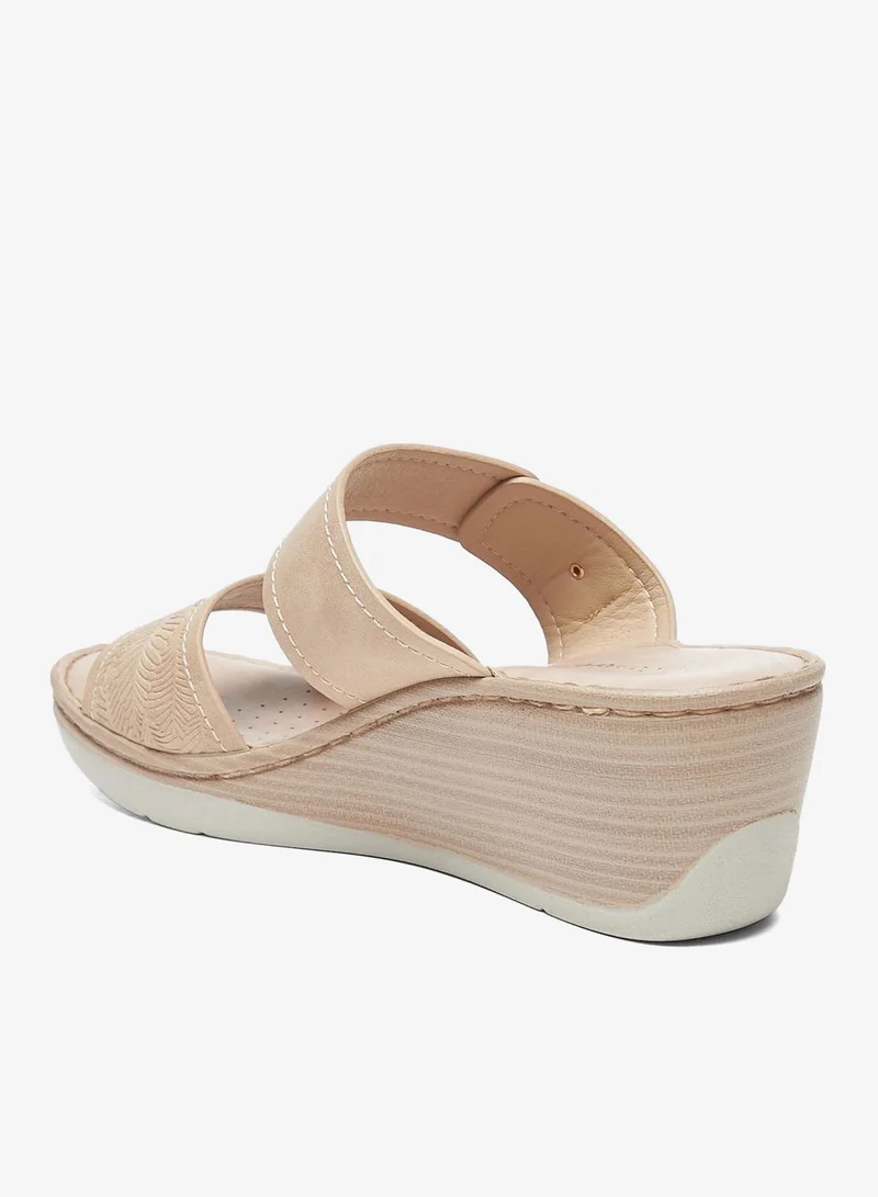 لو كونفورت صنادل بكعب إسفيني بحزامين