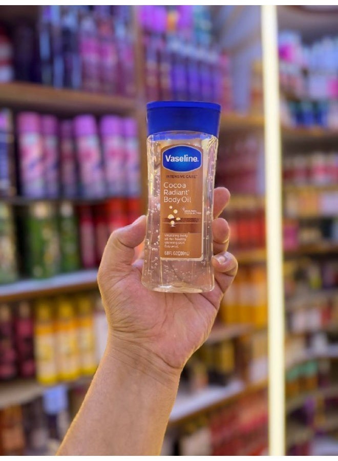 فازلين زيت فازلين بالعناية المكثفة بزبدة الكاكاو 200 مل  Vaseline Intensive Care Cocoa Radiant Body Oil لترطيب عميق ولمعان طبيعي للبشرة الجافة  سريع الامتصاص - Image 2