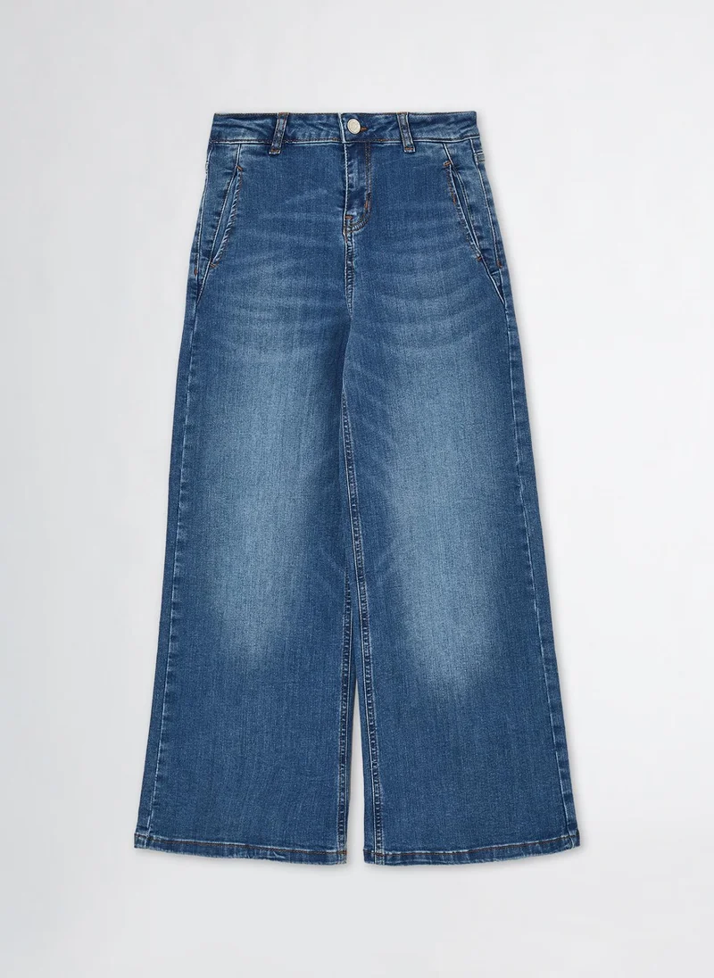 ليو جو High-Rise Flared Jeans