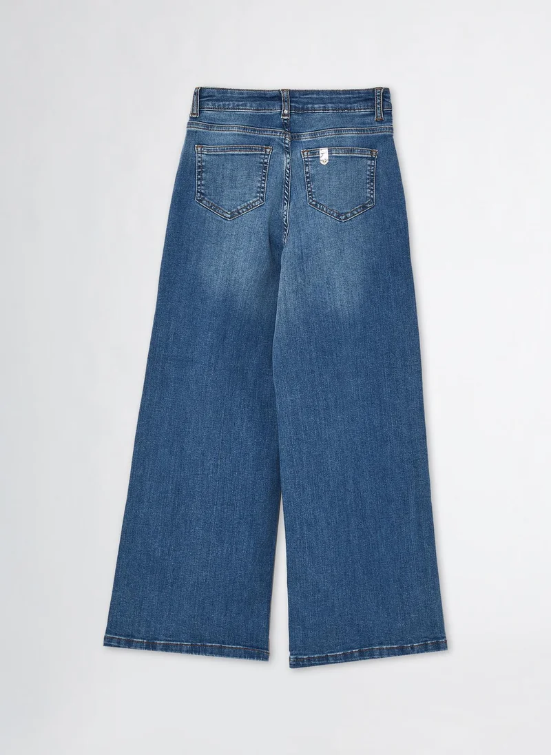 ليو جو High-Rise Flared Jeans
