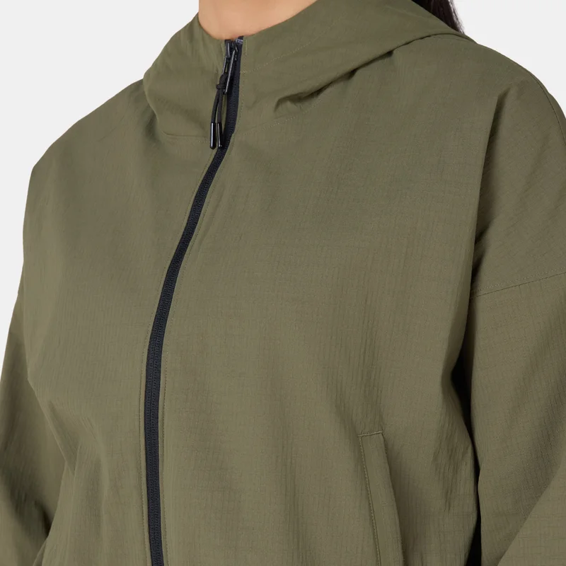 UNDER ARMOUR Green Women's Unstoppable Woven Training Top for Women | Best Price UAE