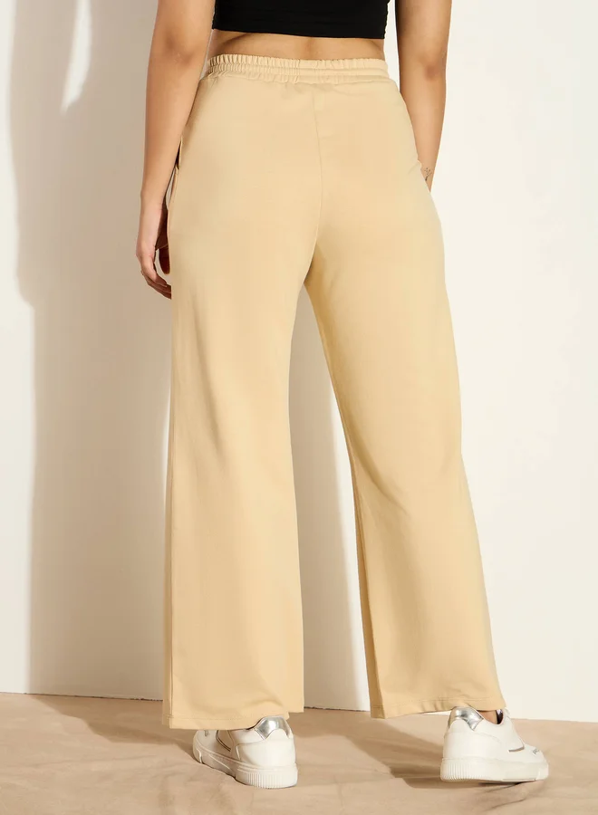 SASSAFRAS Mid Rise Wide Leg Terry Track Pants