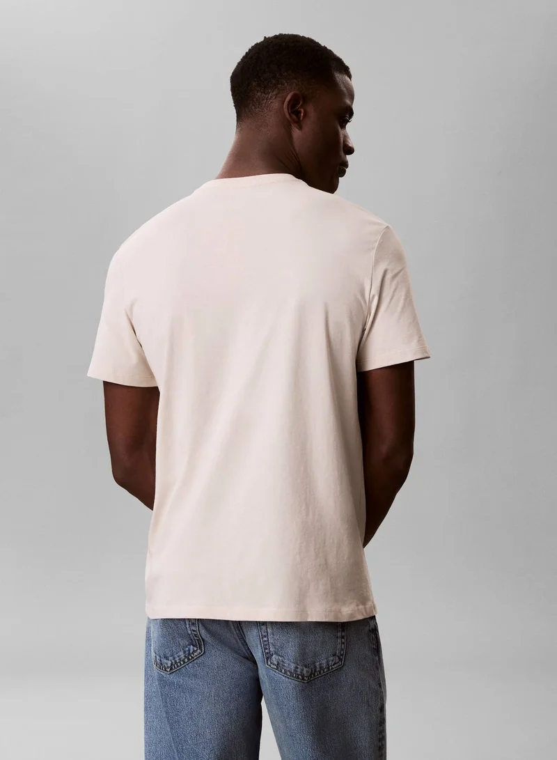 Calvin Klein Jeans Oatmeal Logo Graphic Crew Neck T-Shirt for Men | Best Price UAE