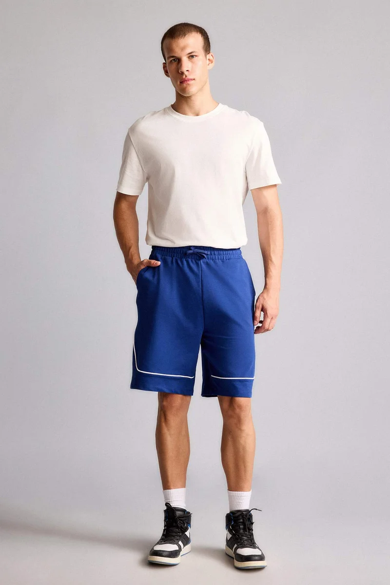 ديفاكتو Baggy Fit Shorts