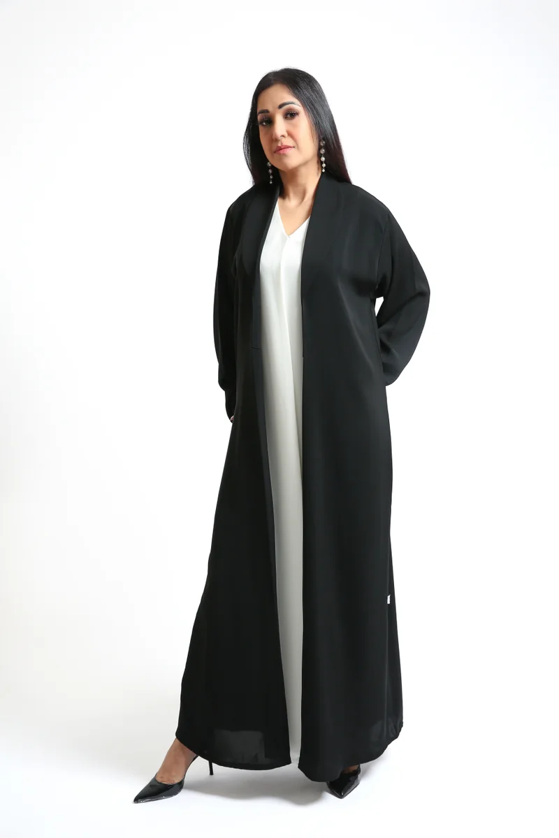 Nikias Nikias Black crepe fabric abaya with nice cuts and unique style