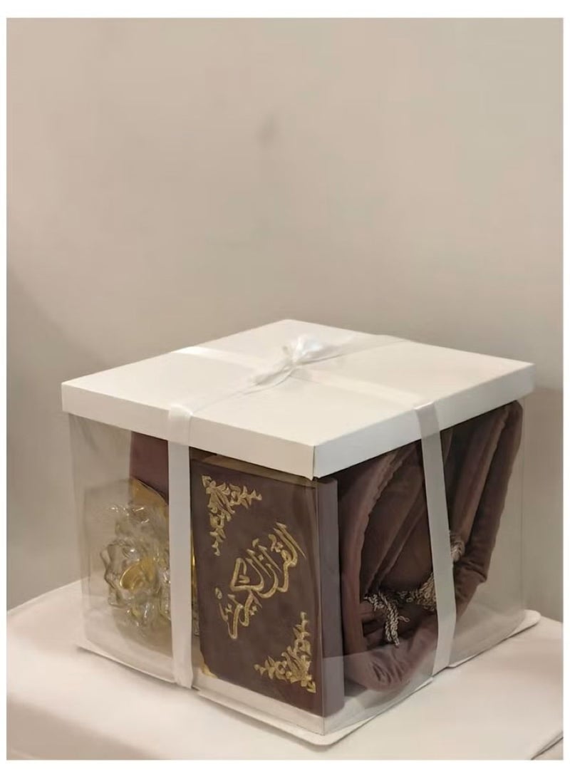 A 5-piece prayer set—featuring a padded prayer mat, prayer garment, incense burner, prayer beads, and a Quran—making it an ideal gift.