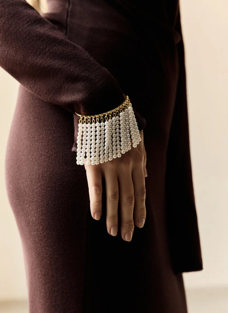 Slim bracelet with fringe of beads
