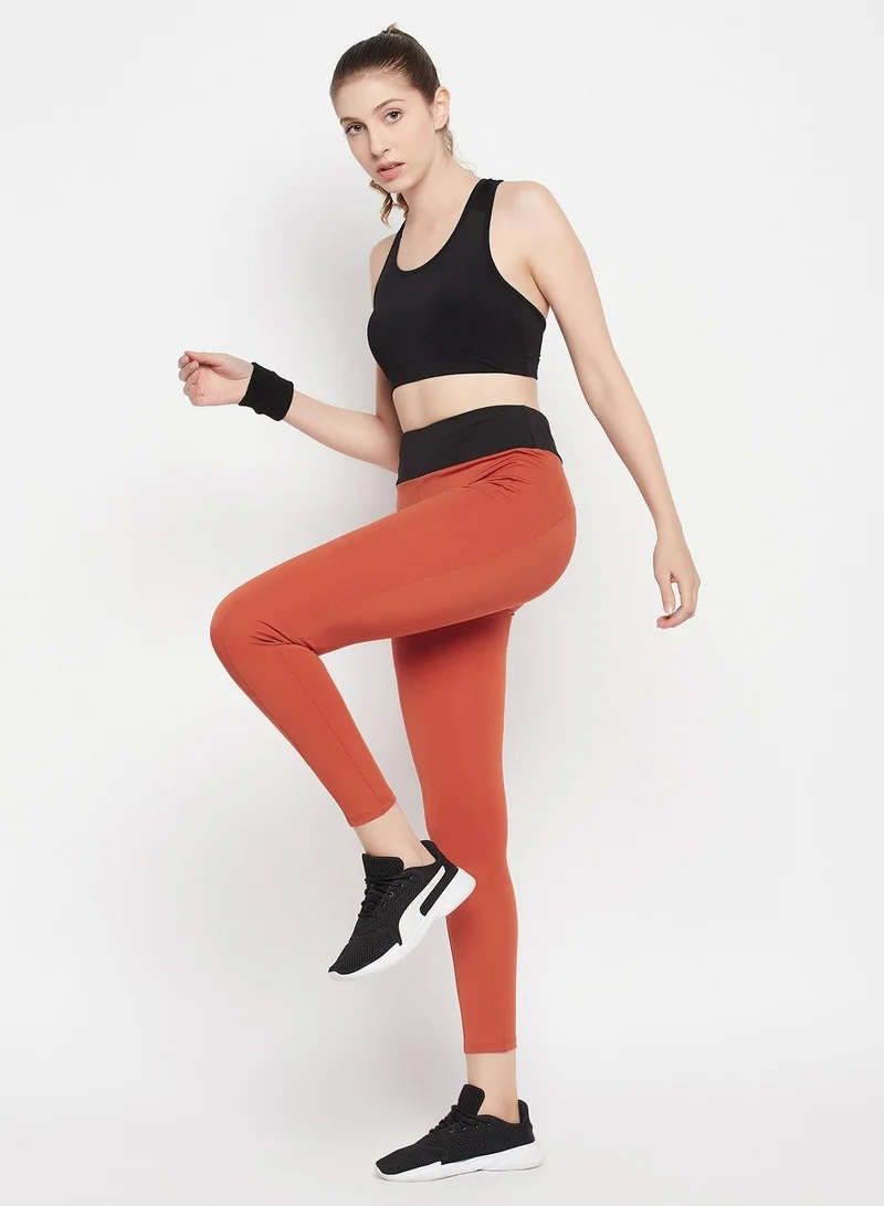كلوفيا Clovia Snug Fit High-Rise Active Tights In Rust Brown