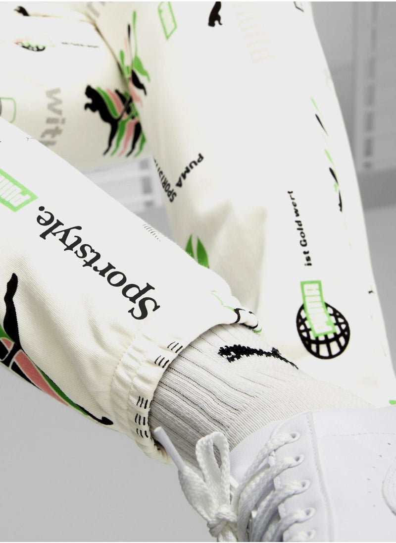 PUMA - Classics Brand Love Aop Sweatpants - Image 1
