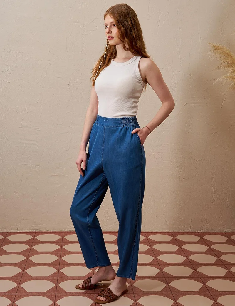 Kayra High-Waisted Elasticated Tapered Lyocell Pants Indigo