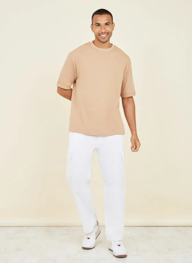 ستايلي Waffle Knit Oversized T-Shirt with Turn-Up Sleeve