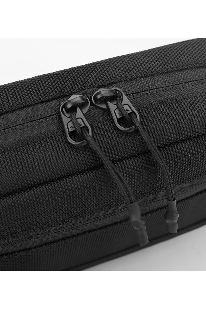 Tactical Sling Bag for Men & Women, Rugged 1680D Ballistic Nylon Crossbody Bag, Water-Repellent & Durable EDC Pack. This compact rectangle-shaped sling bag features an intelligently organized interior with a large main pocket, internal compartments, key hook, and specialized pockets for secure storage. The highly adjustable and detachable strap allows multiple carry modes: as a crossbody bag, over the shoulder, around the waist, or as a sleek clutch using the top handle/wrist strap. Ideal for urban navigation, work commute, weekend hiking, travel, and tactical operations. Built to last with a focus on functionality, security, and a modern tactical style. This versatile companion keeps your essentials like phone, wallet, tools, and valuables organized and within easy reach. Redefine your everyday carry with this smart, adaptable, and sturdy unisex bag. Perfect for outdoor enthusiasts, professionals, students, and anyone seeking a reliable and stylish hands-free solution. Key features in