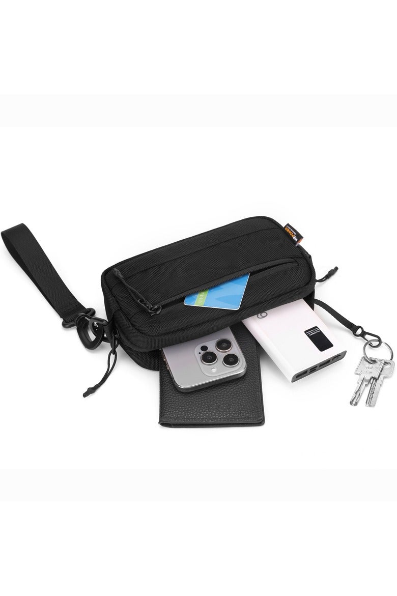 Tactical Sling Bag for Men & Women, Rugged 1680D Ballistic Nylon Crossbody Bag, Water-Repellent & Durable EDC Pack. This compact rectangle-shaped sling bag features an intelligently organized interior with a large main pocket, internal compartments, key hook, and specialized pockets for secure storage. The highly adjustable and detachable strap allows multiple carry modes: as a crossbody bag, over the shoulder, around the waist, or as a sleek clutch using the top handle/wrist strap. Ideal for urban navigation, work commute, weekend hiking, travel, and tactical operations. Built to last with a focus on functionality, security, and a modern tactical style. This versatile companion keeps your essentials like phone, wallet, tools, and valuables organized and within easy reach. Redefine your everyday carry with this smart, adaptable, and sturdy unisex bag. Perfect for outdoor enthusiasts, professionals, students, and anyone seeking a reliable and stylish hands-free solution. Key features in