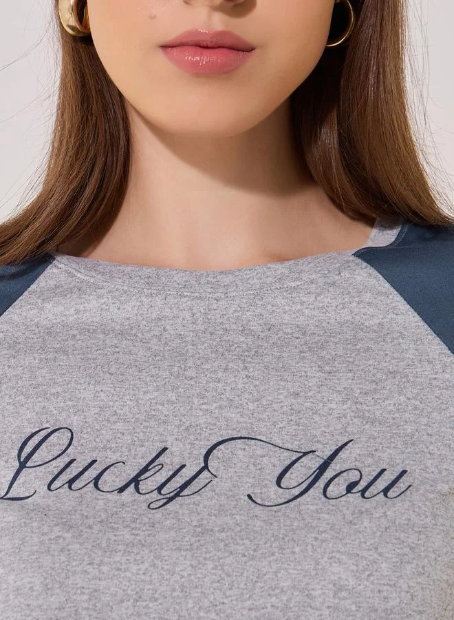 تايك تو Slogan Print Reglan Sleeve Round Neck T-Shirt