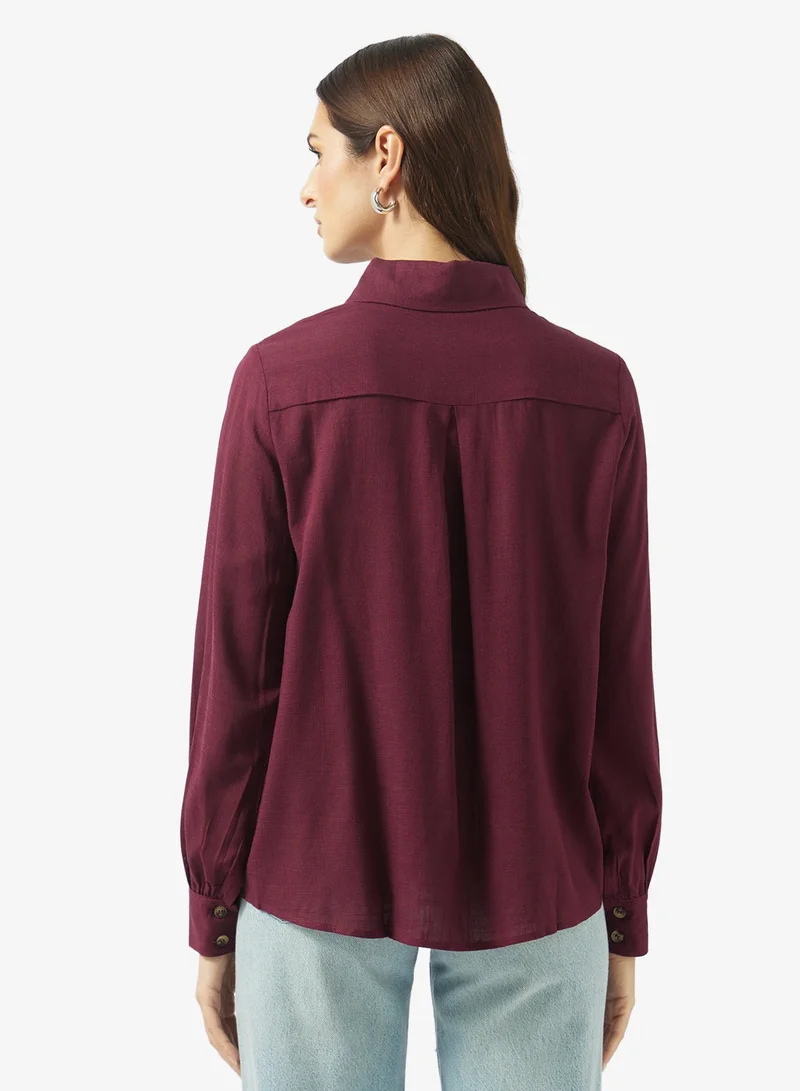 ايلا قميص بأزرار وتفاصيل مقصوصة بالليزر