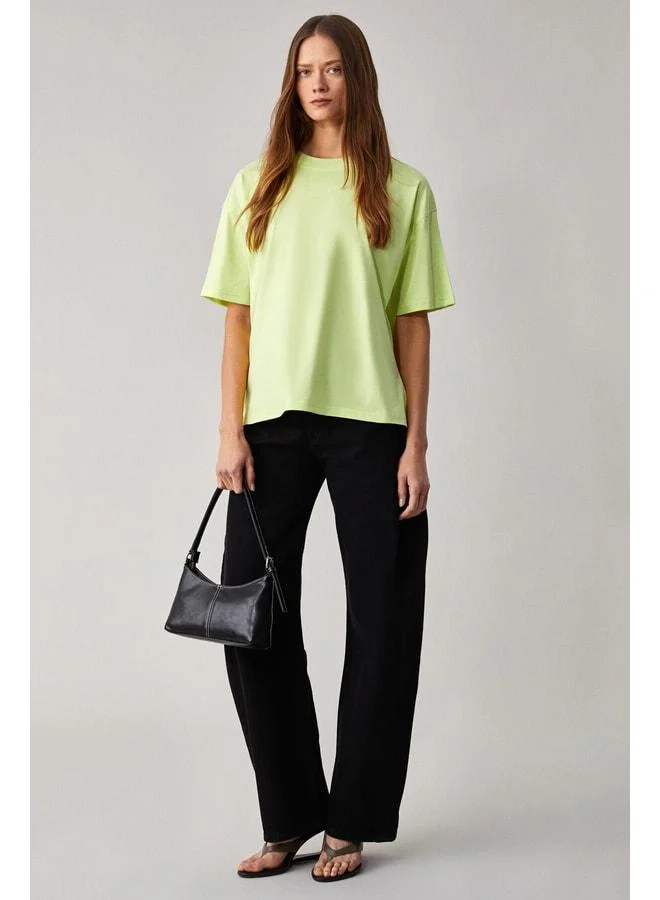 Grimelange Jemmy Women’s %100 Organic Cotton Relaxed Fit Slit Round-Neck Neon Green T-Shirt.