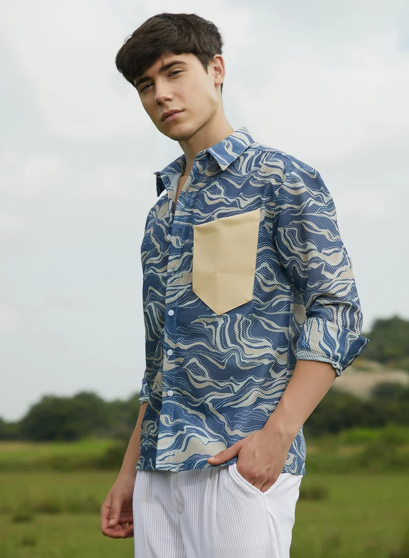 Campus Sutra Campus Sutra Men's Indigo Blue Fluid-Block Shirt For Casual Wear | Spread Collar | Long Cuffed Sleeves | Button Closure | Oversized Shirt Crafted With Comfort Fit For Everyday Wear