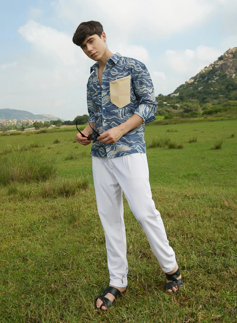 Campus Sutra Campus Sutra Men's Indigo Blue Fluid-Block Shirt For Casual Wear | Spread Collar | Long Cuffed Sleeves | Button Closure | Oversized Shirt Crafted With Comfort Fit For Everyday Wear