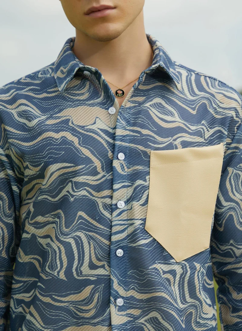 Campus Sutra Campus Sutra Men's Indigo Blue Fluid-Block Shirt For Casual Wear | Spread Collar | Long Cuffed Sleeves | Button Closure | Oversized Shirt Crafted With Comfort Fit For Everyday Wear