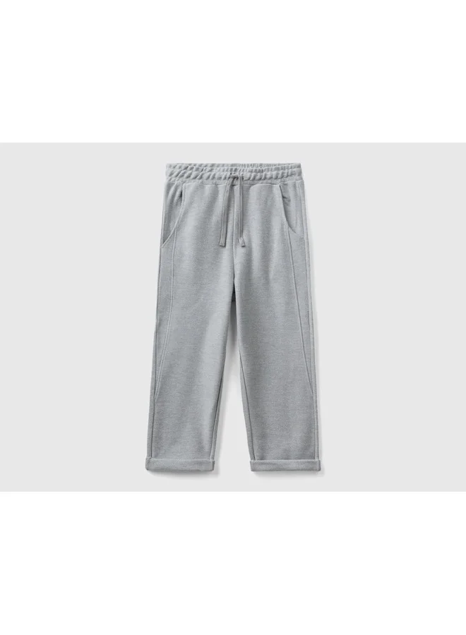 يونايتد كولورز أوف بينتيون Carrot Fit Joggers With "Be" Embroidery