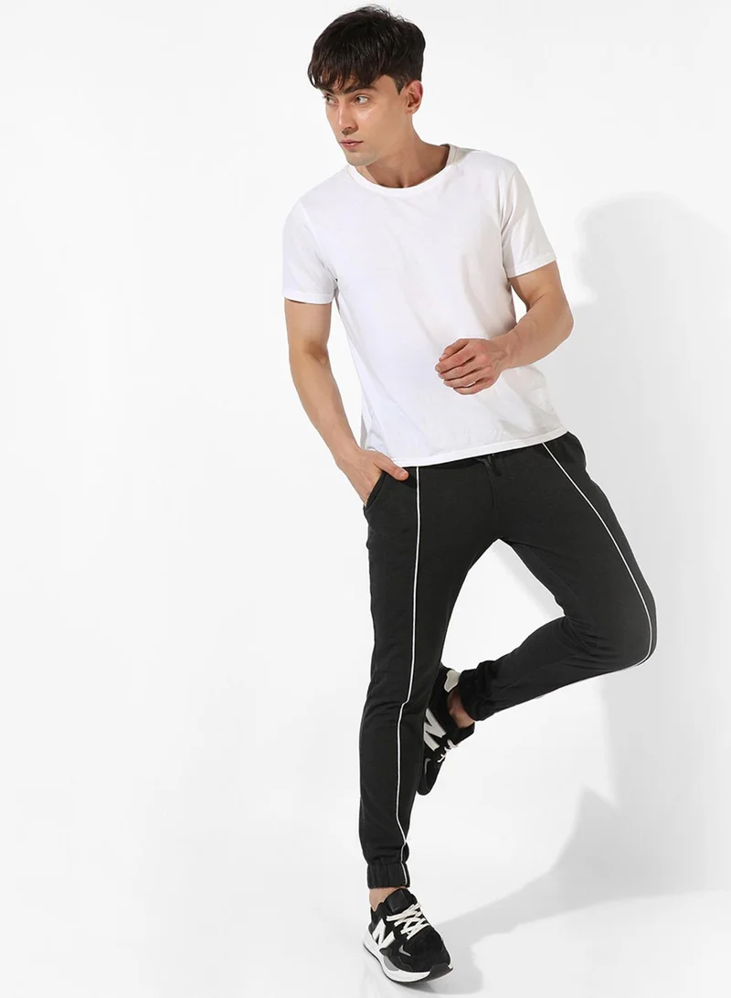 Campus Sutra Campus Sutra Men's Solid Black Regular Fit Trackpants For Casual Wear | Angled Open Pockets | Drawstring Waist | Trackpants Crafted With Comfort Fit & High Performance For Everyday Wear