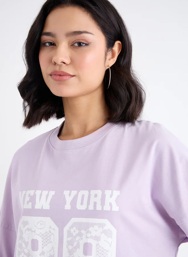 Styli Styli Women Lilac Graphic Oversized T-Shirt with Dropped Shoulder