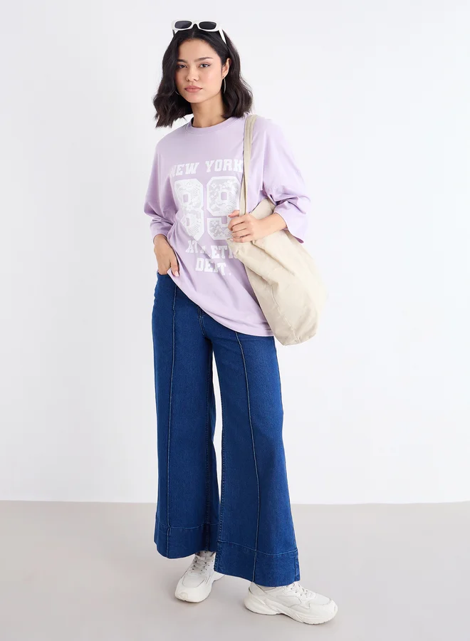 ستايلي Styli Women Lilac Graphic Oversized T-Shirt with Dropped Shoulder