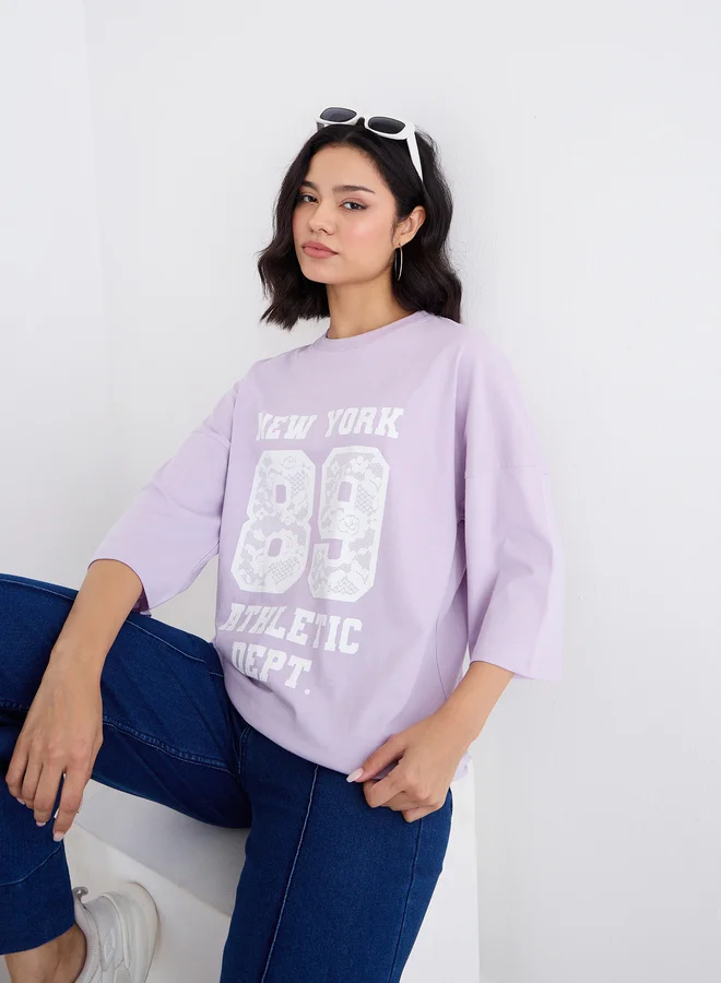 Styli Styli Women Lilac Graphic Oversized T-Shirt with Dropped Shoulder