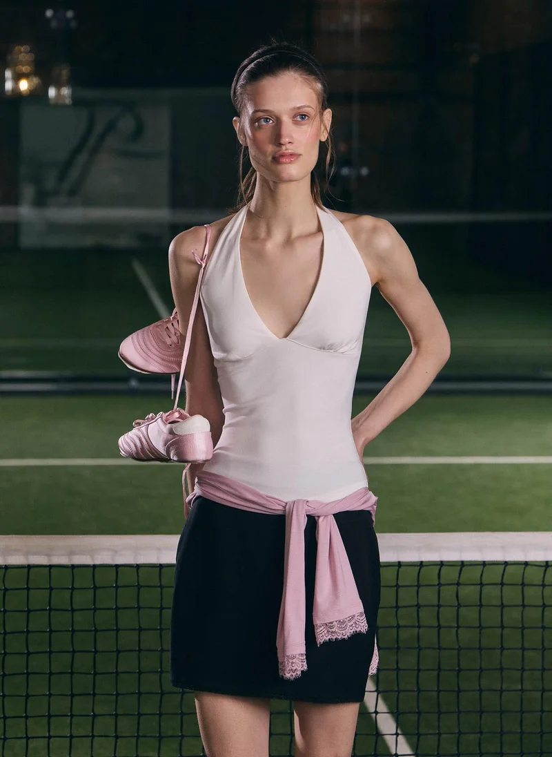 Lichi  Top with a deep V-neckline and open back for Women | Best Price UAE