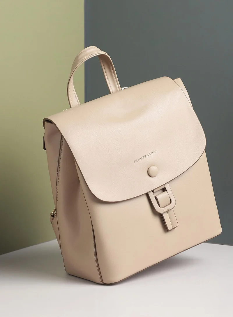صوص هاوت Haute Sauce Women's The Buckle Flap Backpack For Casual Wear | Beige Colour | One-Size | Magnetic Closure | Solid Pattern | Vegan Leather Material | Backpack For Woman & Girls