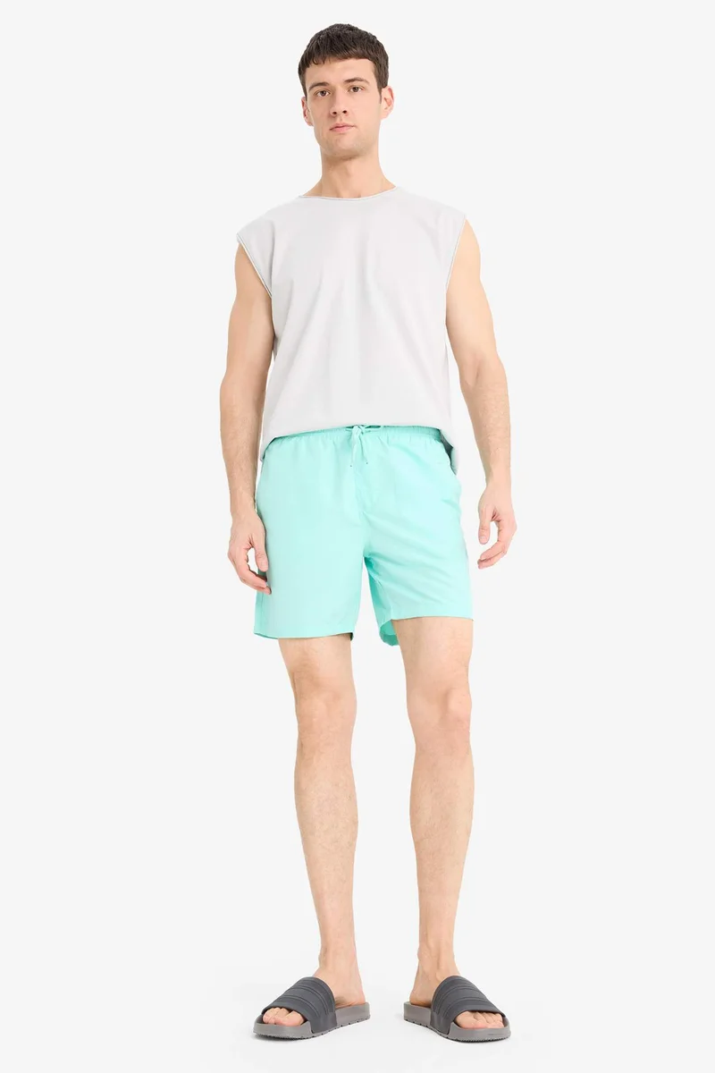 Defacto  Regular Fit Mesh Lined Lightweight Fabric Swim Shorts for Men | Best Price UAE