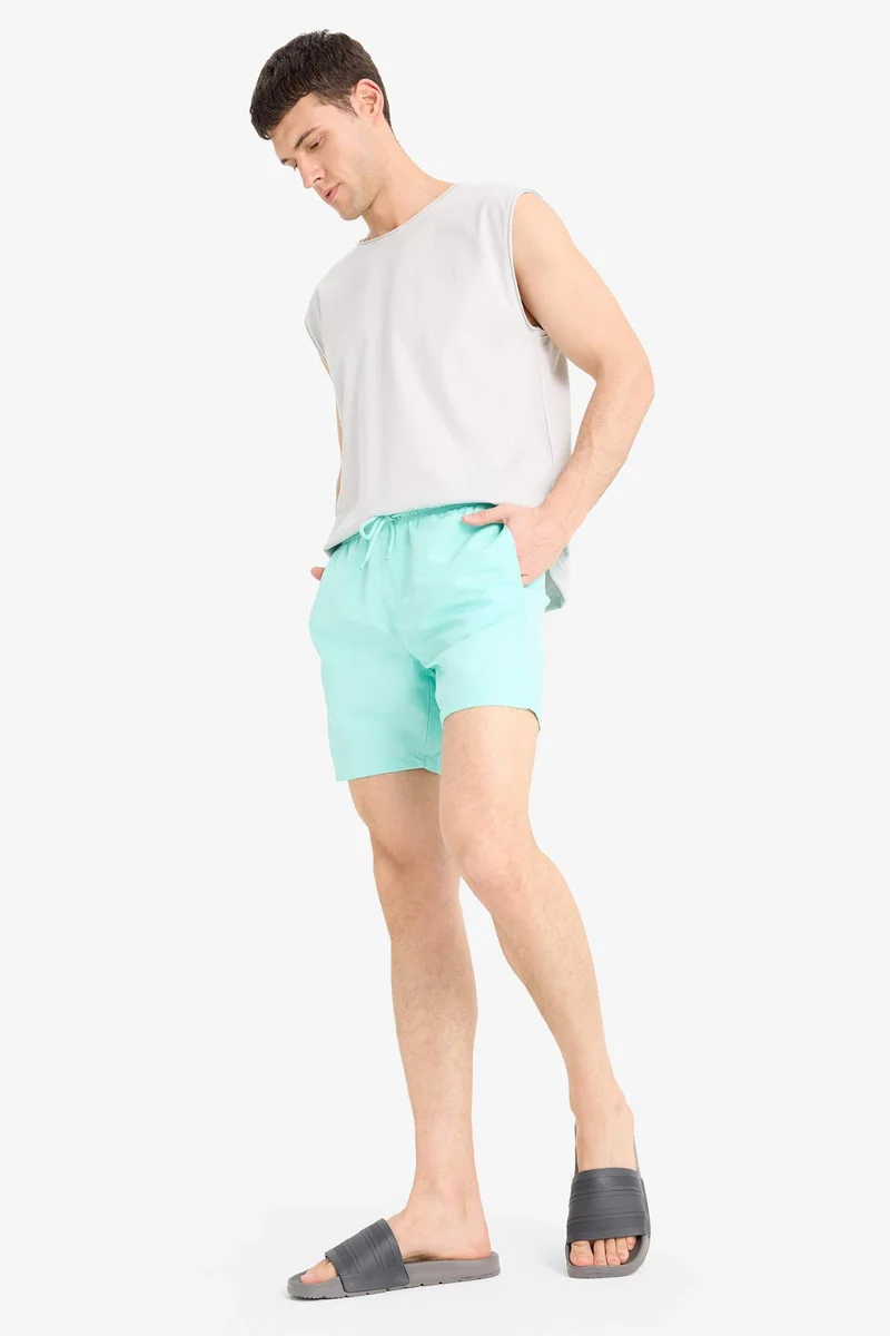 Defacto  Regular Fit Mesh Lined Lightweight Fabric Swim Shorts for Men | Best Price UAE