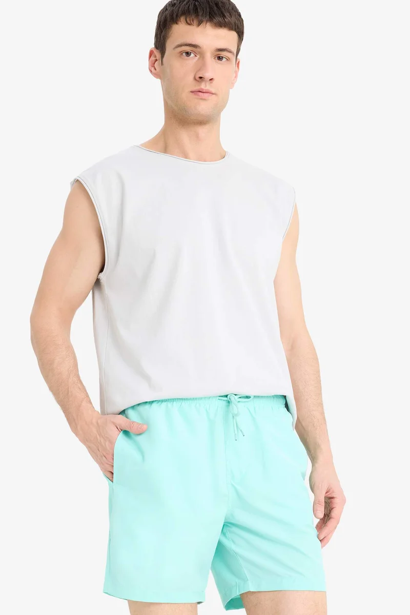Defacto  Regular Fit Mesh Lined Lightweight Fabric Swim Shorts for Men | Best Price UAE
