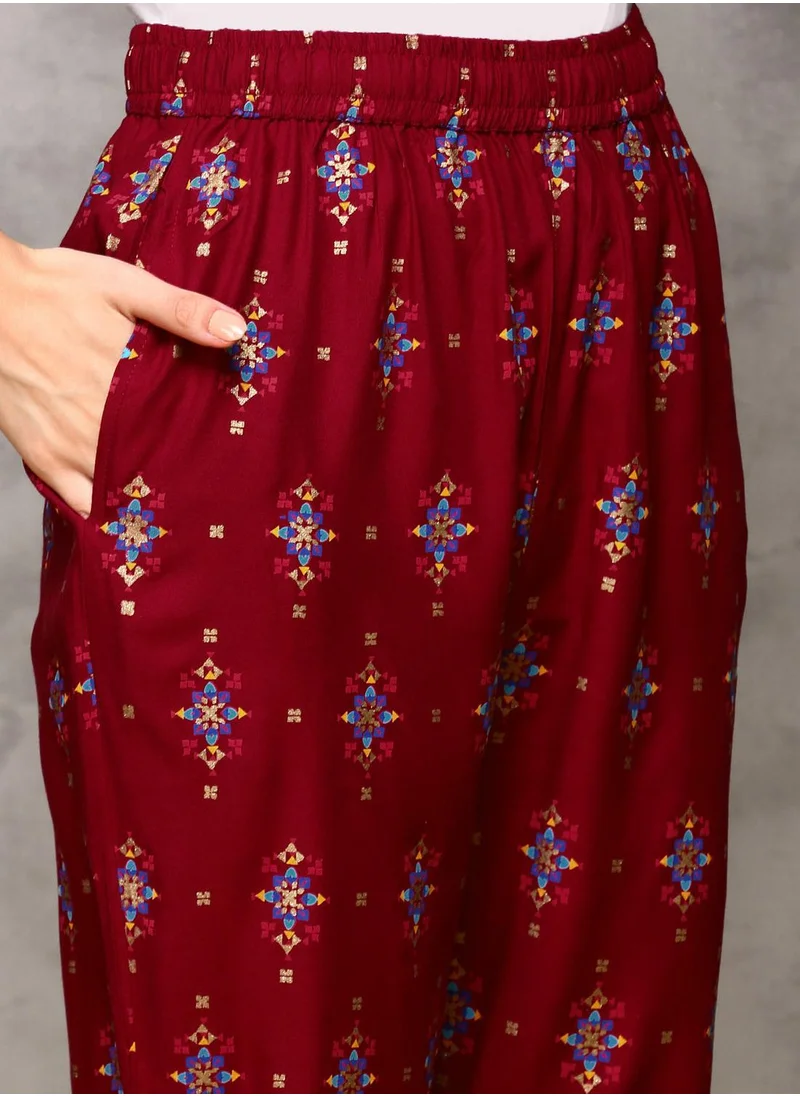 آي شين Anarkali Fit Printed Pattern Round Neck Three-Quarter Sleeves Maroon Colour Woven Cotton Kurta Set for Women with Semi Elastic Closure - A Statement Piece for Every Look