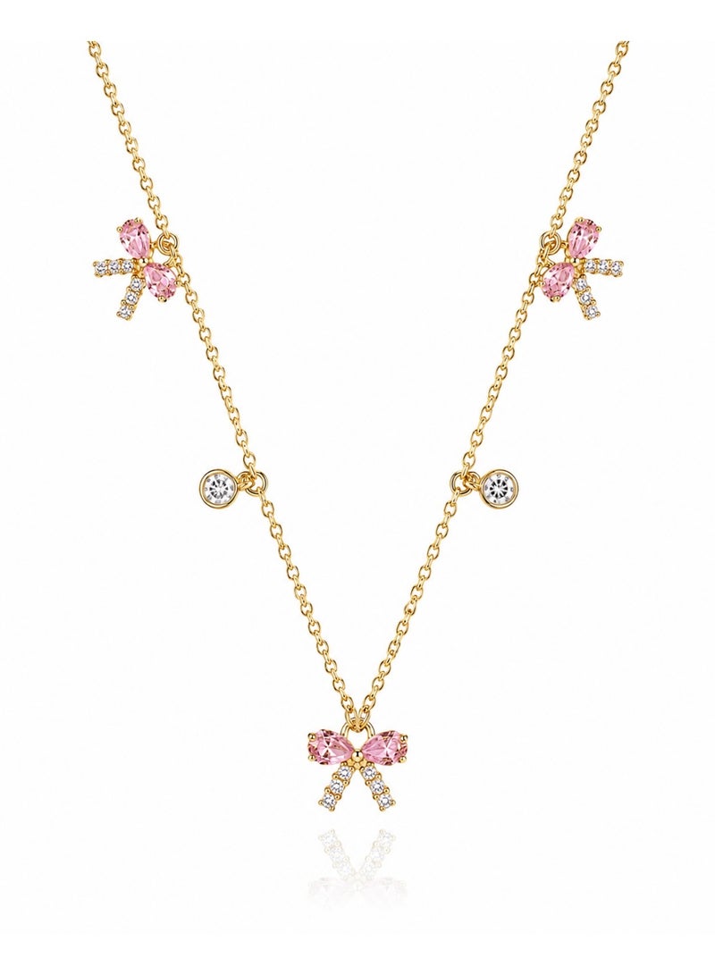 RAFAL Women's Gold-Tone Station Necklace with Three Pink Crystal Bow Charms - Image 1