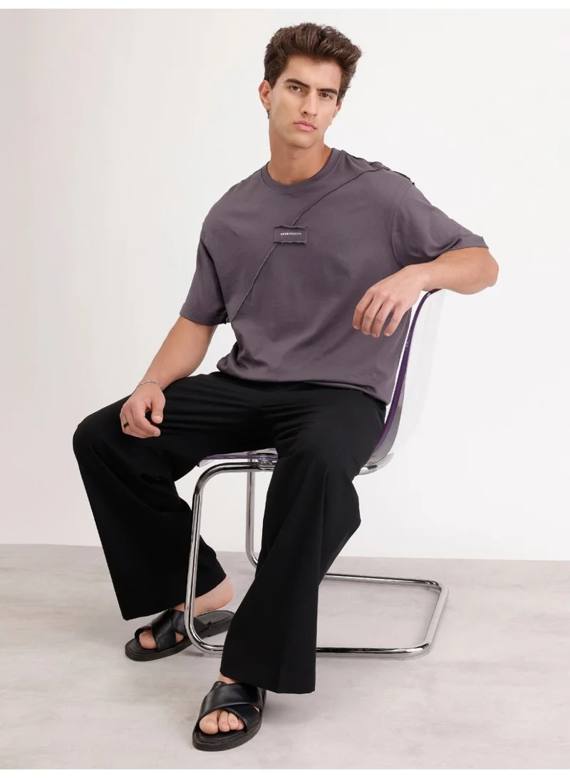 روجن Solid Oversized Cut & Sew T-Shirt | Dark Grey