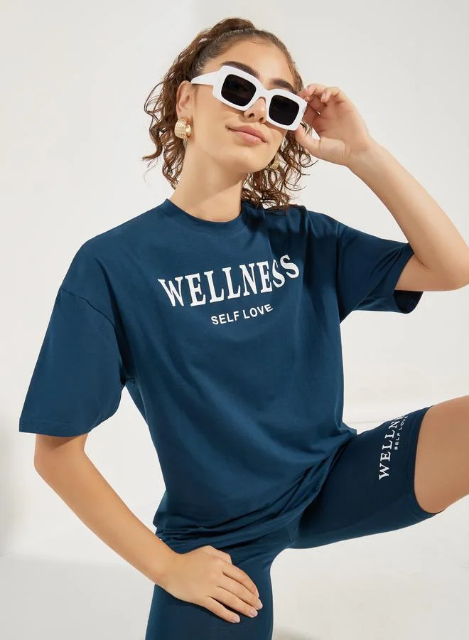 ستايلي Styli Oversized Slogan Print Round Neck Drop Shoulder T-Shirt