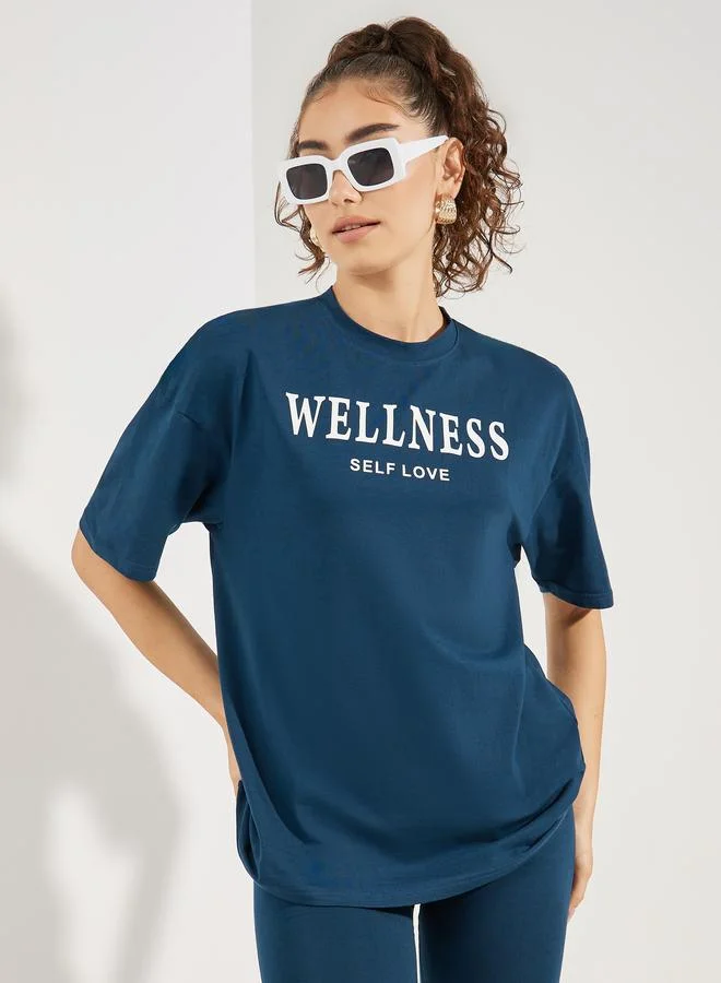 ستايلي Styli Oversized Slogan Print Round Neck Drop Shoulder T-Shirt