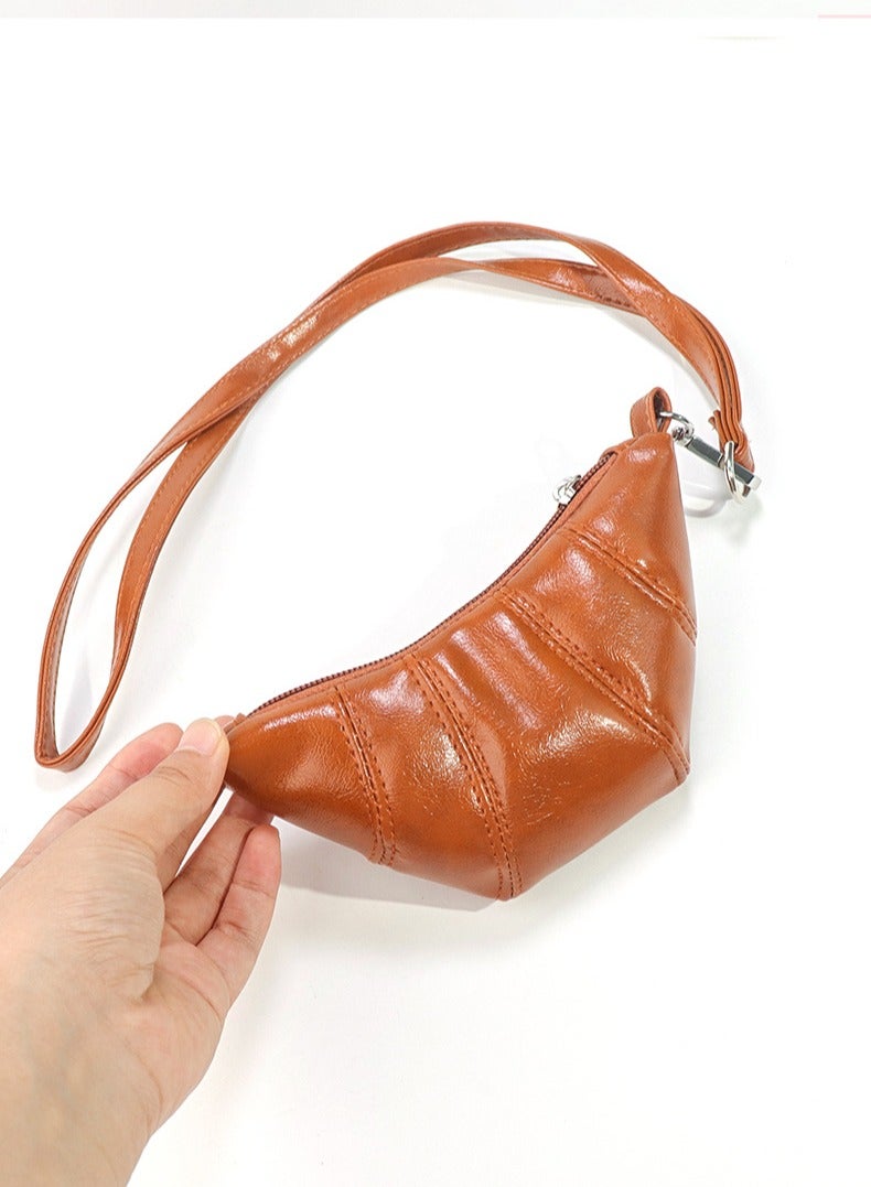 عام حقيبة كرواسون صغيرة لطيفة معلقة على الرقبة بتصميم جديد لعام 2025، حقيبة صغيرة للعملات المعدنية - Image 1