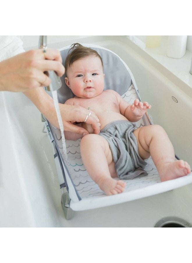 the FIRST years Sure Comfort Folding Baby Bather Baby To Toddler Bath Tub Noslip Seat For Sink Or Tub Use  - Image 4