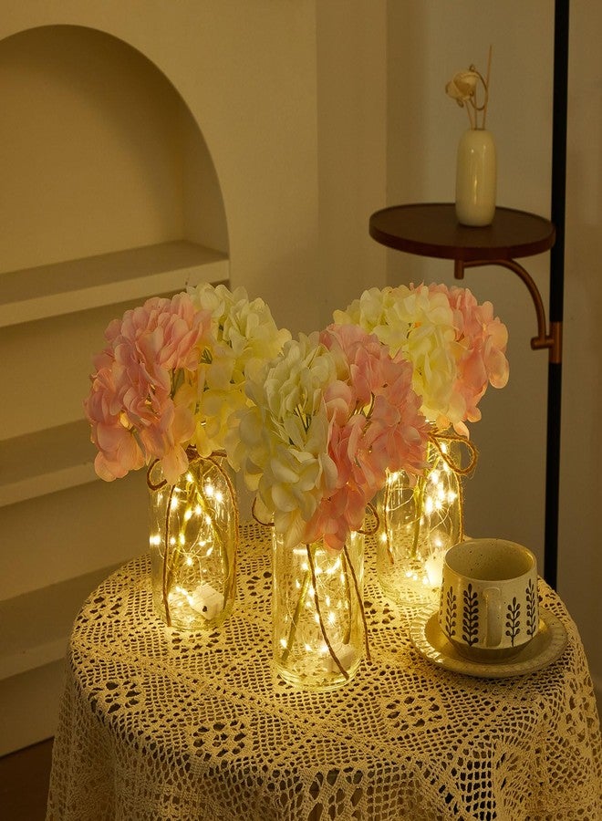 چوينت مجموعة من 4 مرطبانات زجاجية مزينة بإضاءة LED على شكل زهور الكوبية باللونين الوردي والأبيض، مثالية لتزيين الطاولات وحفلات الزفاف والمناسبات الأخرى. - Image 5