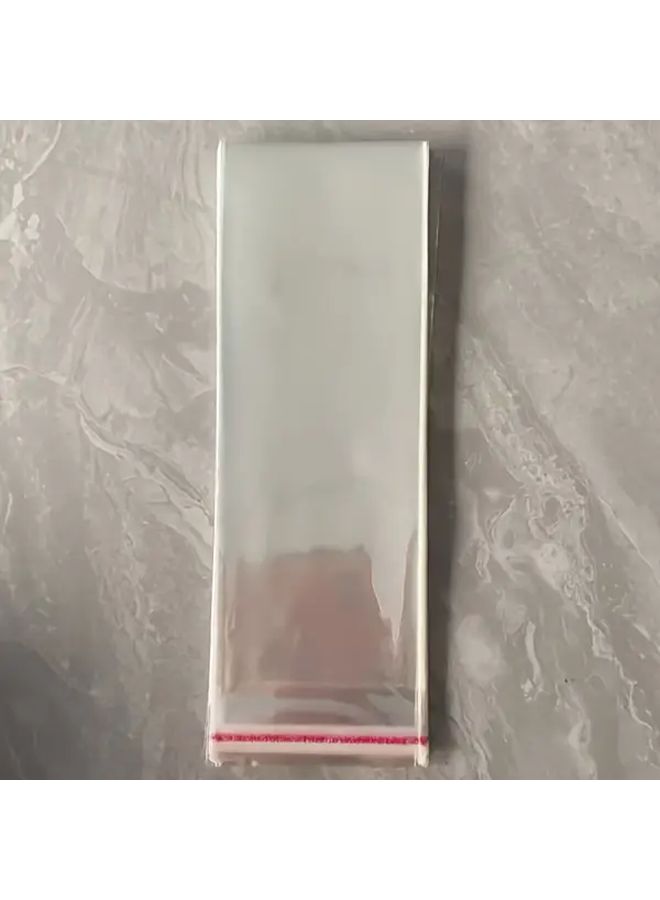 100 كيس بلاستيكي شفاف من OPP مقاس 21x8 سم مع إغلاق رباط قابل لإعادة الاستخدام لتغليف المجوهرات - Image 4